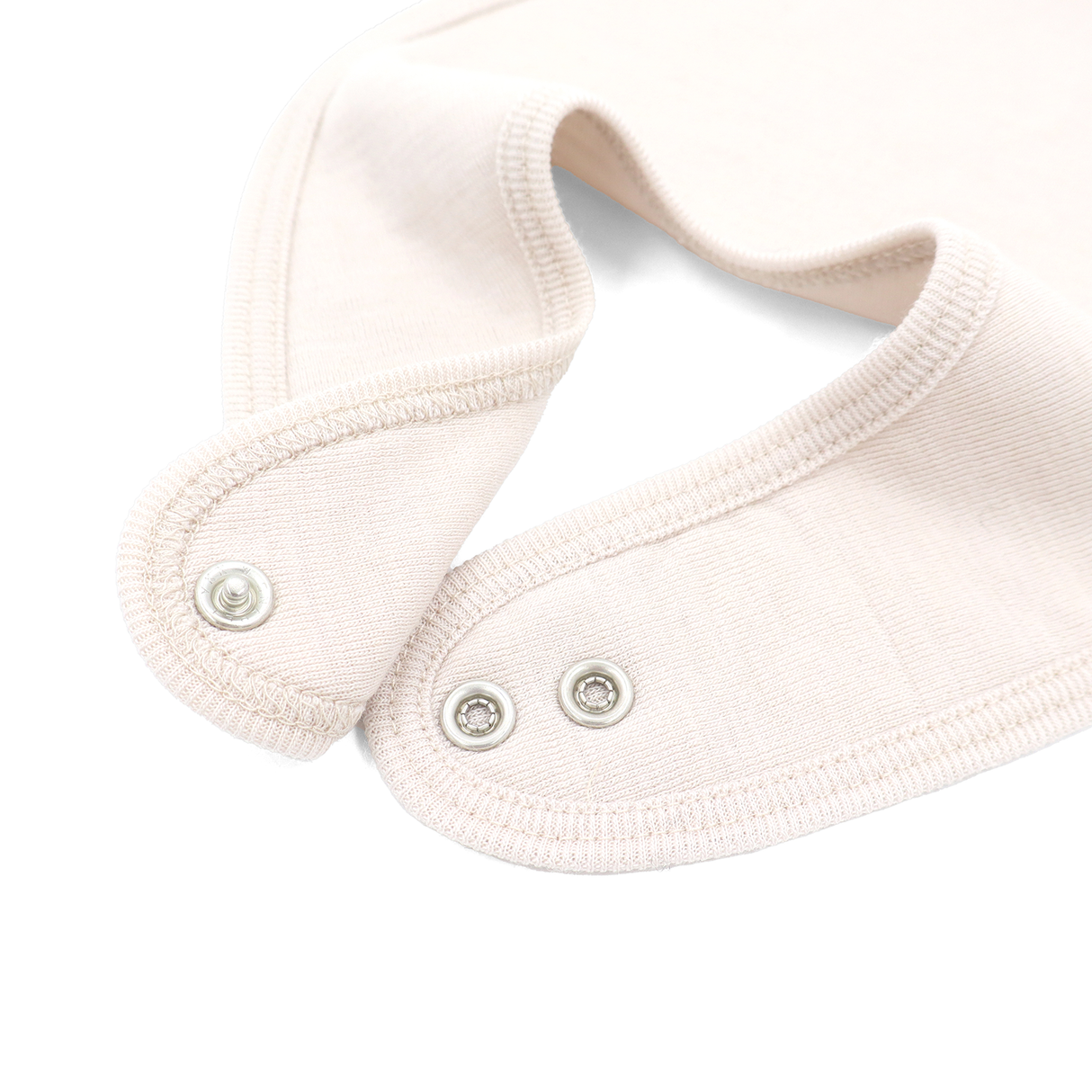 Bib from 100% certified fine merino with a pacifier clip function