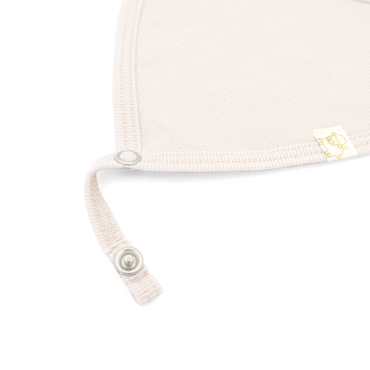 Bib from 100% certified fine merino with a pacifier clip function