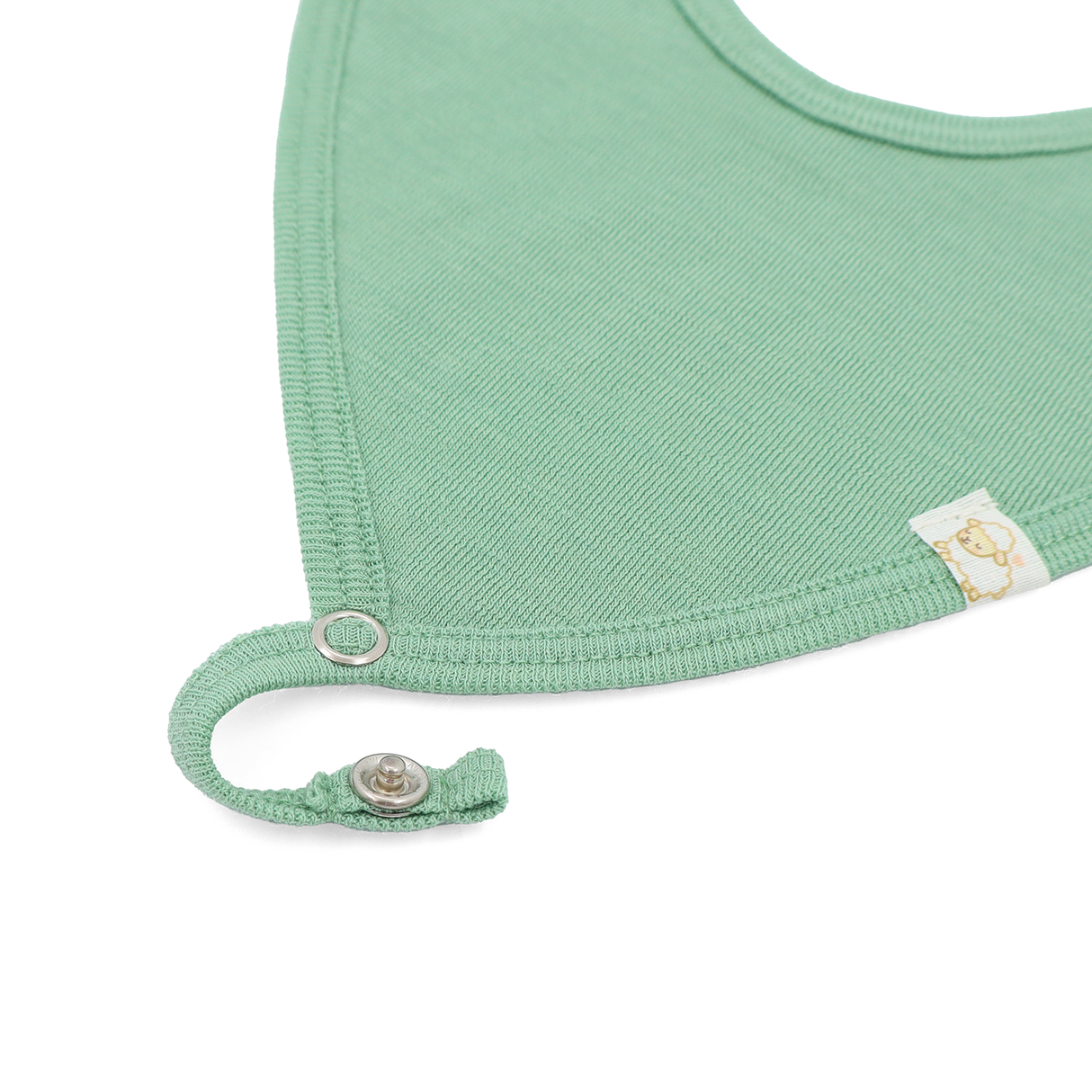 Bib from 100% certified fine merino with a pacifier clip function