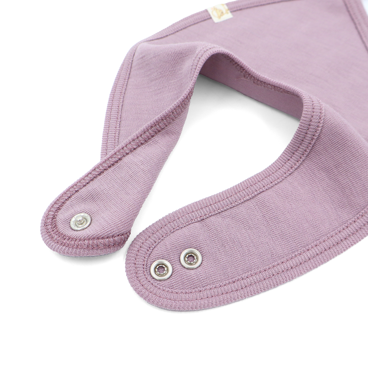 Bib from 100% certified fine merino with a pacifier clip function