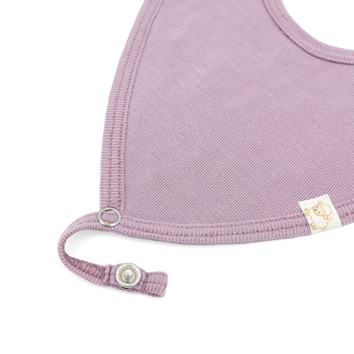 Bib from 100% certified fine merino with a pacifier clip function