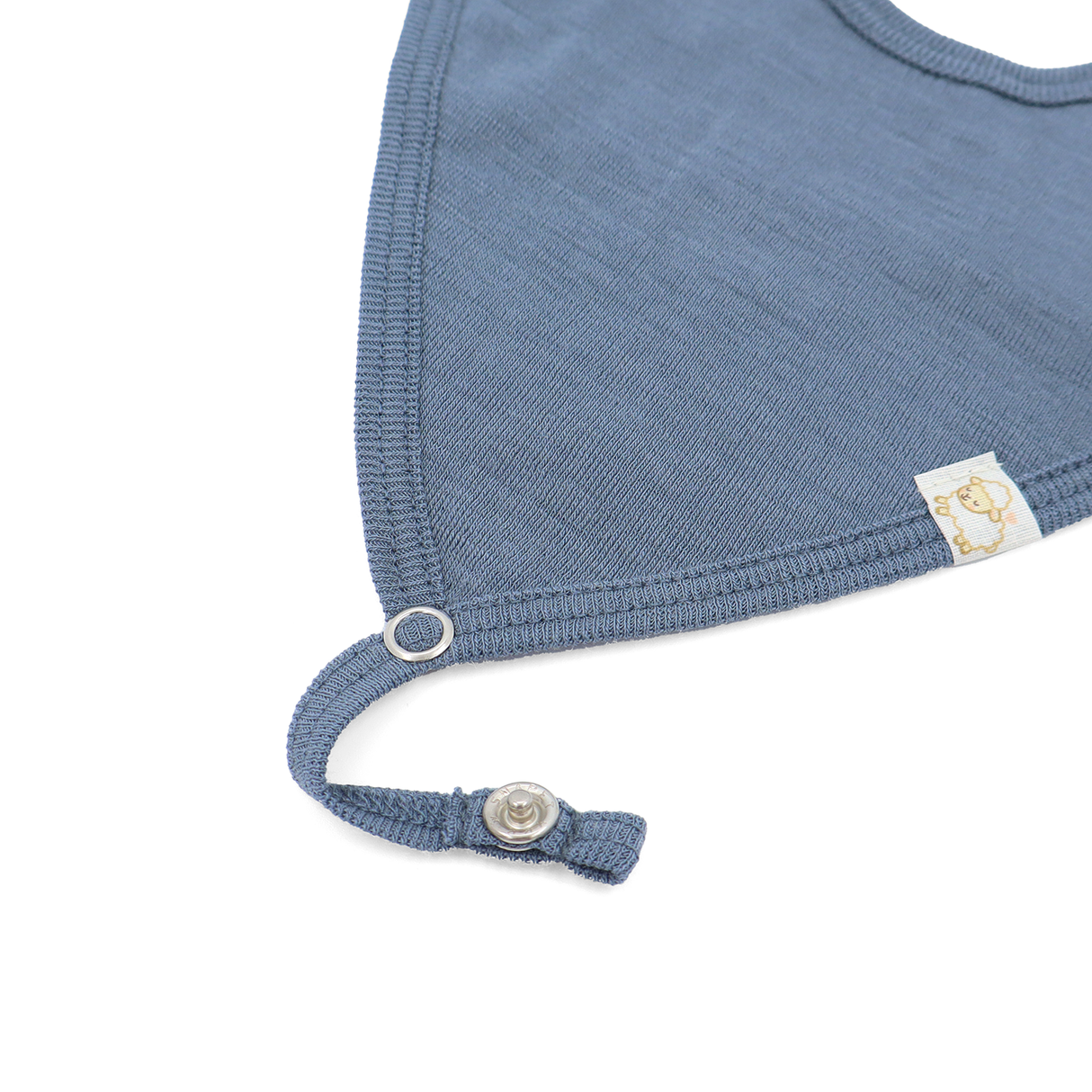 Bib from 100% certified fine merino with a pacifier clip function