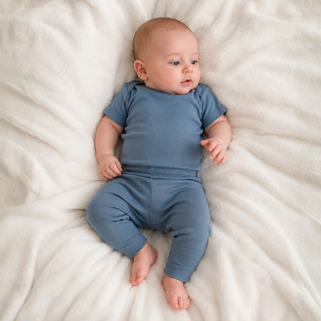 Short-sleeved bodysuit made from 100% certified fine merino wool