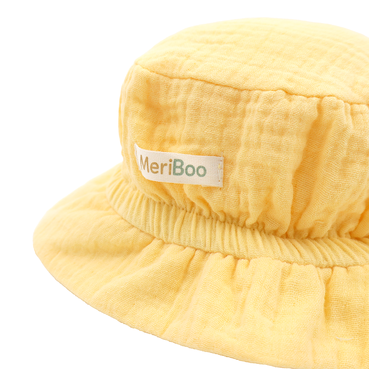 "Soft Breeze" hat made of 100% organic muslin with an extended back to protect the neck